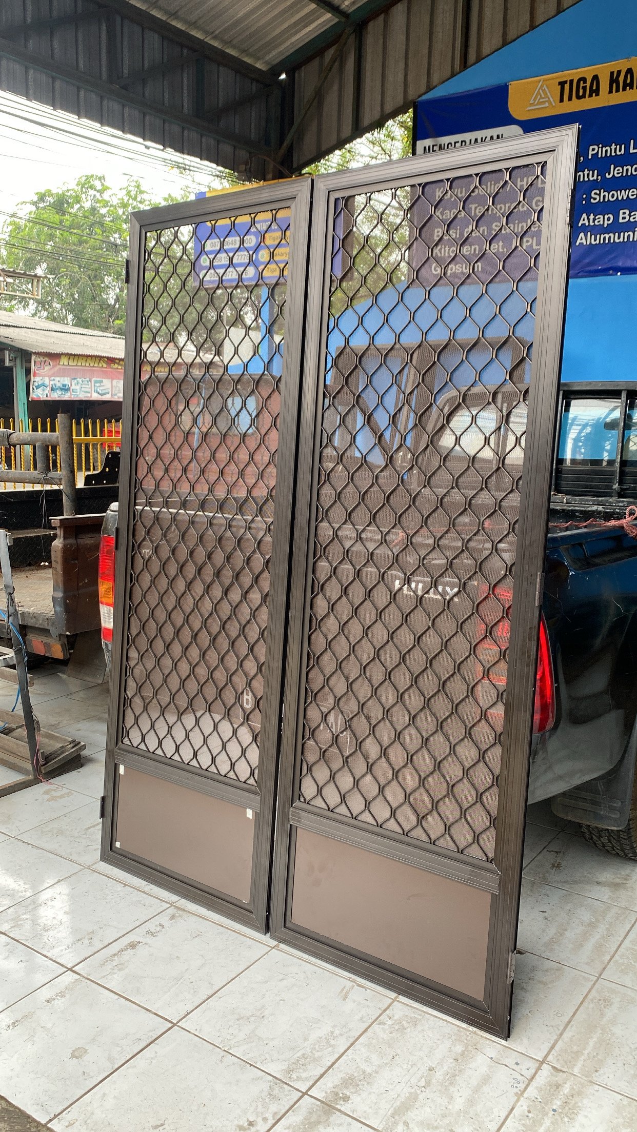 Pintu expanda double coklat, bekasi